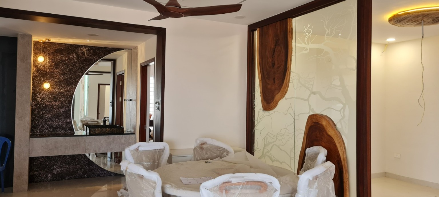 Dining room with feature partition and illuminated vanity wall